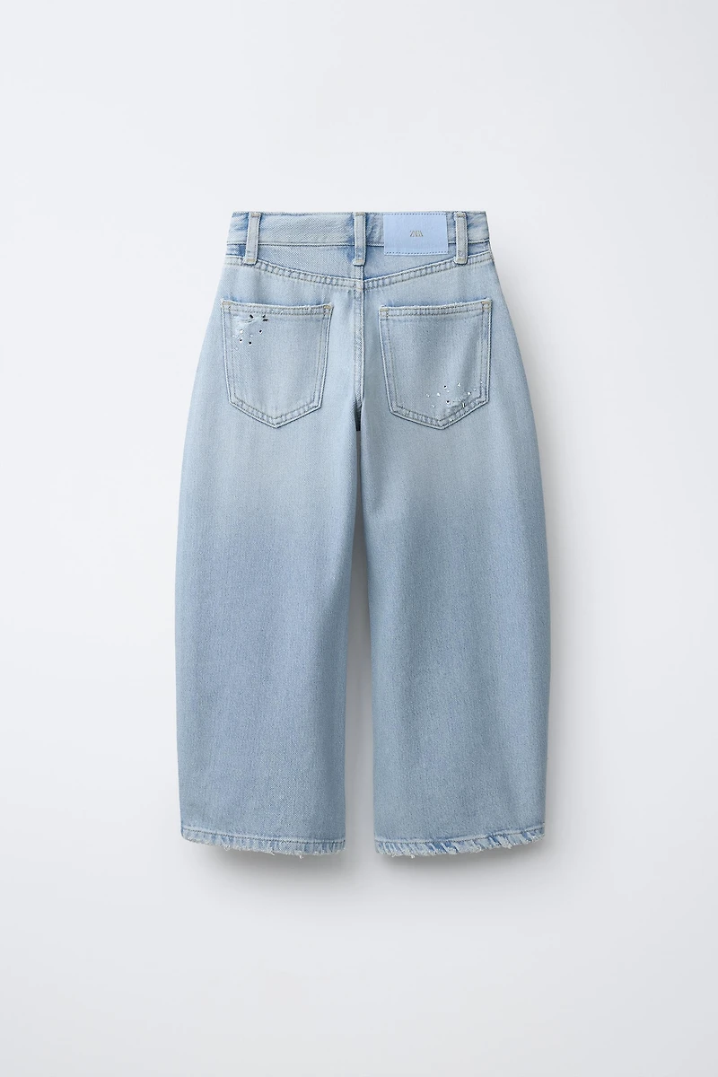 RIPPED AND RHINESTONE BALLOON JEANS