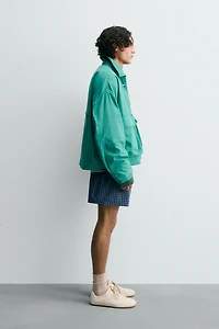 BLOUSON COUPE CARRÉE À BRANDEBOURGS