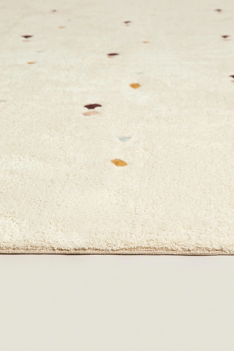CHILDREN’S MULTICOLORED EMBROIDERED DIAMOND RUG