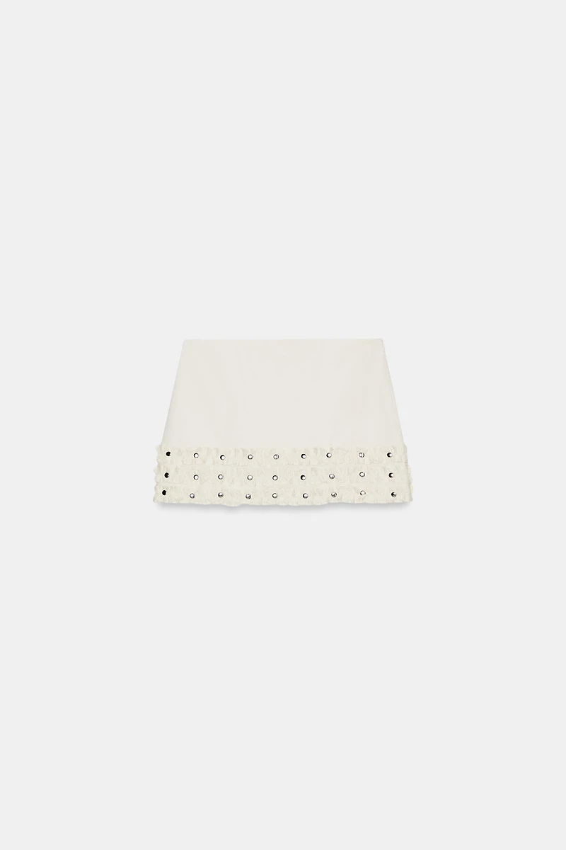 RUFFLED STUDDED MINI SKIRT