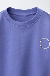 INTERLOCK TEXT T-SHIRT