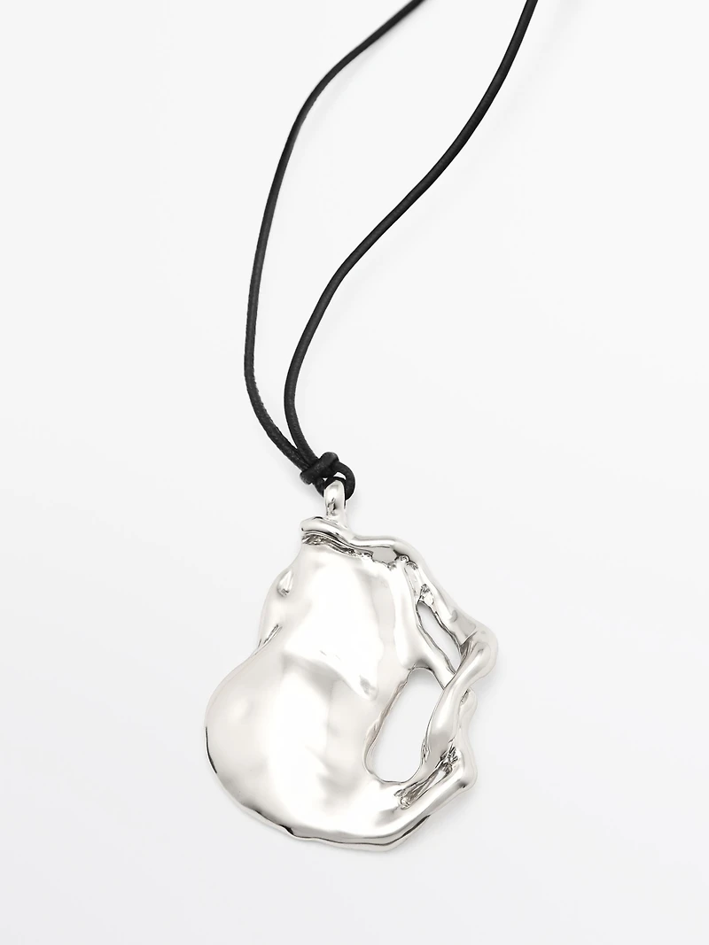 Pendentif pièce abstraite