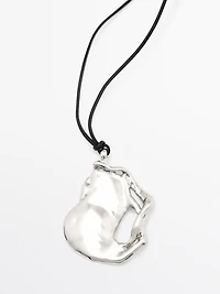 Pendentif pièce abstraite