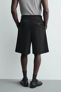 BERMUDA RELAXED FIT À PLIS ET CEINTURE