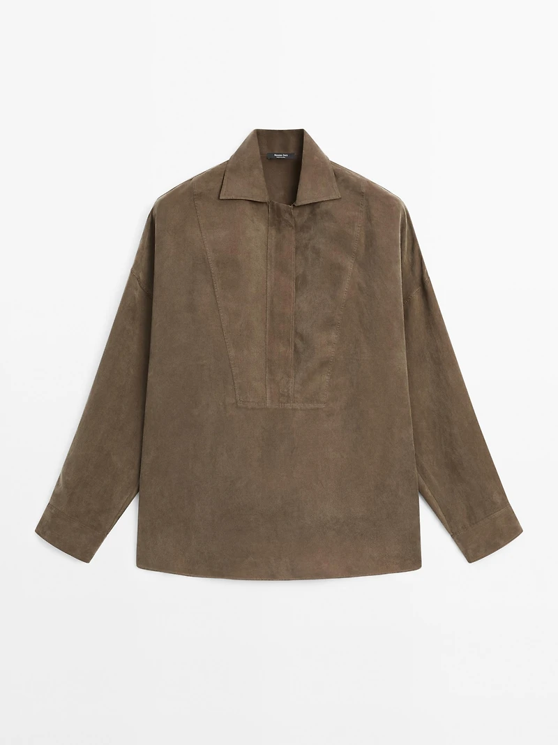 Blouse with zip on the chest