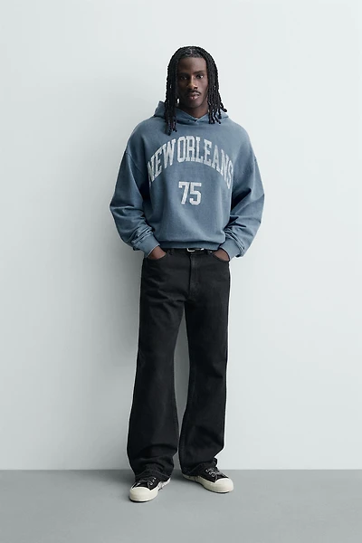 WASHED PRINTED TEXT SWEATSHIRT
