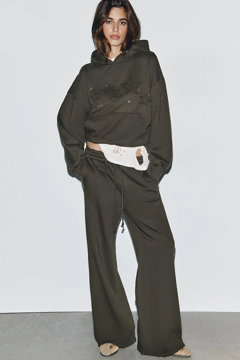 WASHED STAR STUD SWEATSHIRT