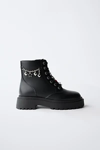 LACED ANKLE BOOTS WITH CHARMS