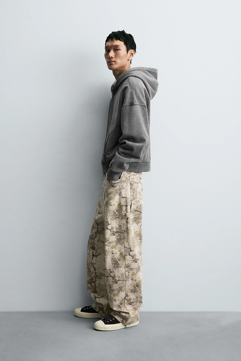 ABSTRACT PRINT BAGGY FIT CARPENTER PANTS