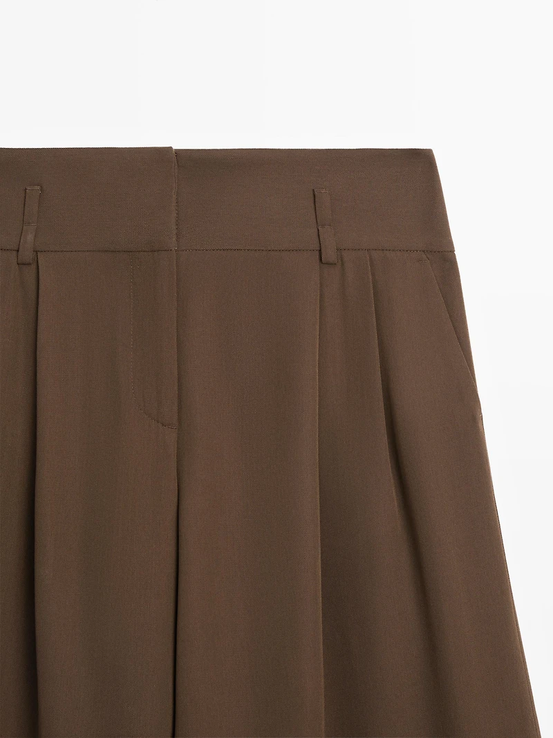Long Bermuda shorts with turn-up hems