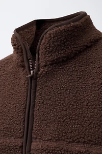 VESTE EFFET MOUTON LISERÉS