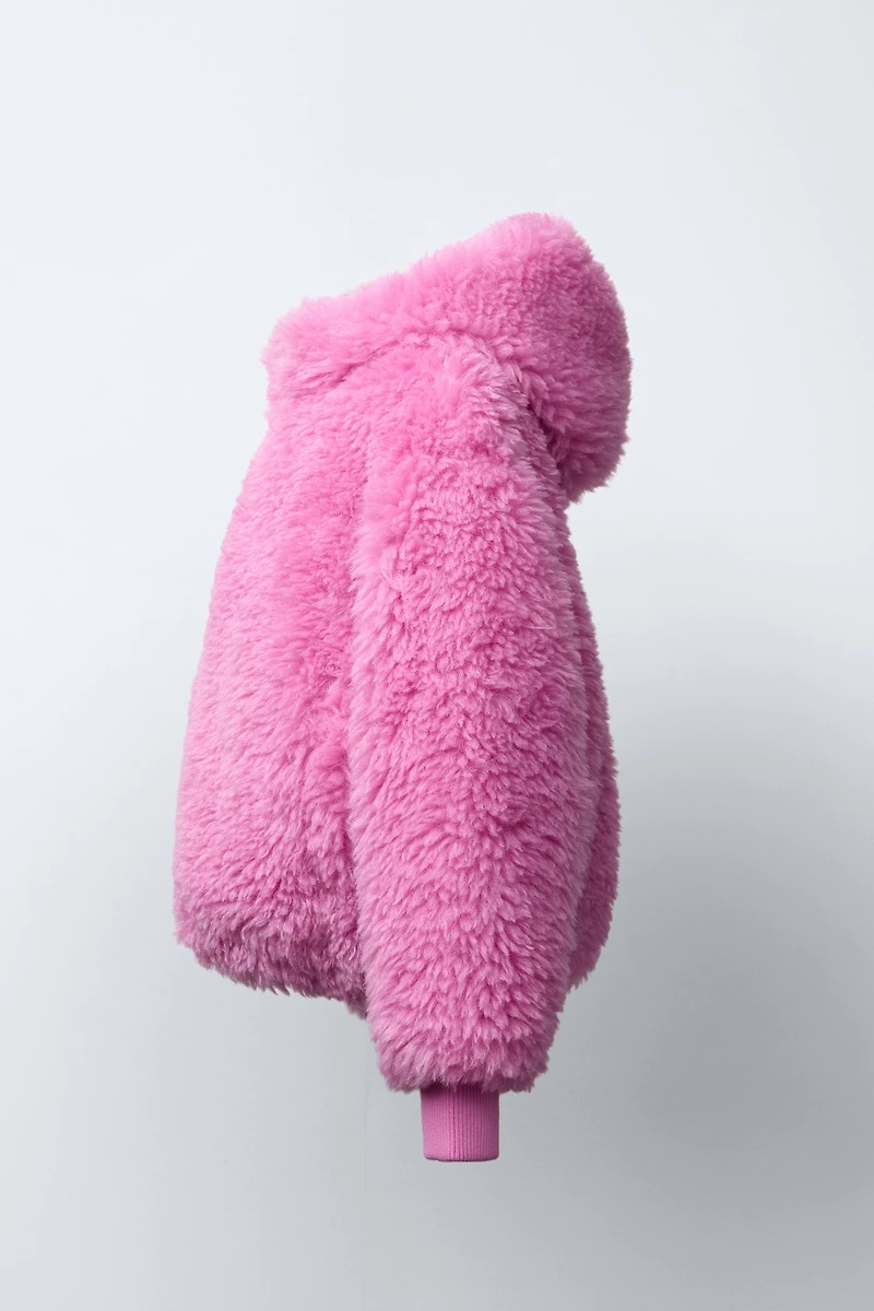 VESTE EFFET FOURRURE À CAPUCHE