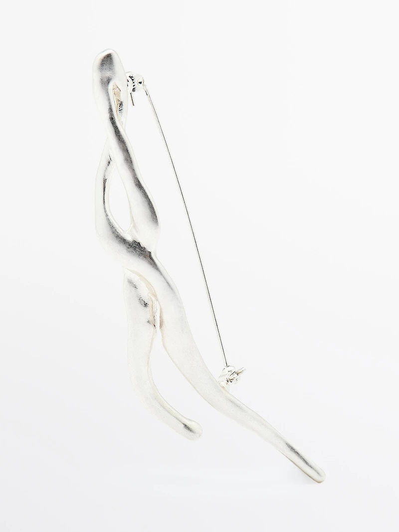 Broche métallique abstraite