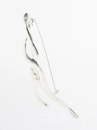 Broche métallique abstraite