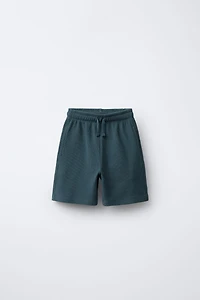 T-SHIRT AND BERMUDA OTTOMAN LABEL SET