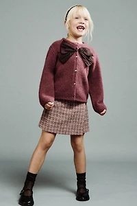 GILET EN MAILLE AVEC NŒUD SATIN