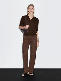 Polo laine en maille tressée