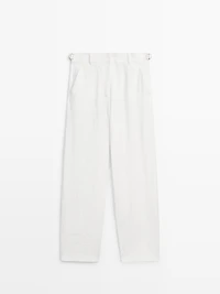 Flowing trousers with buckles
