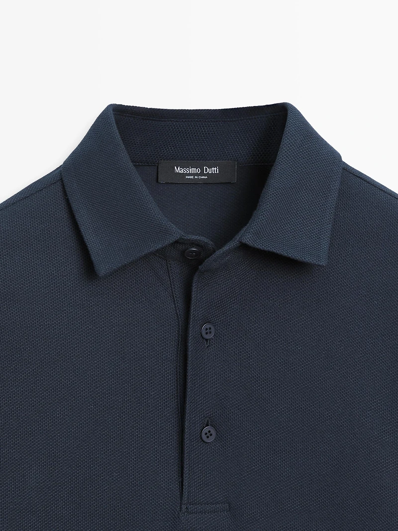 Polo texturé en piqué à manches longues