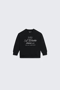 50TH ANNIVERSARY EMBROIDERED TEXT SWEATSHIRT