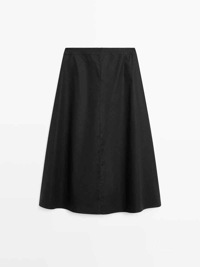 Jupe midi taille marquée