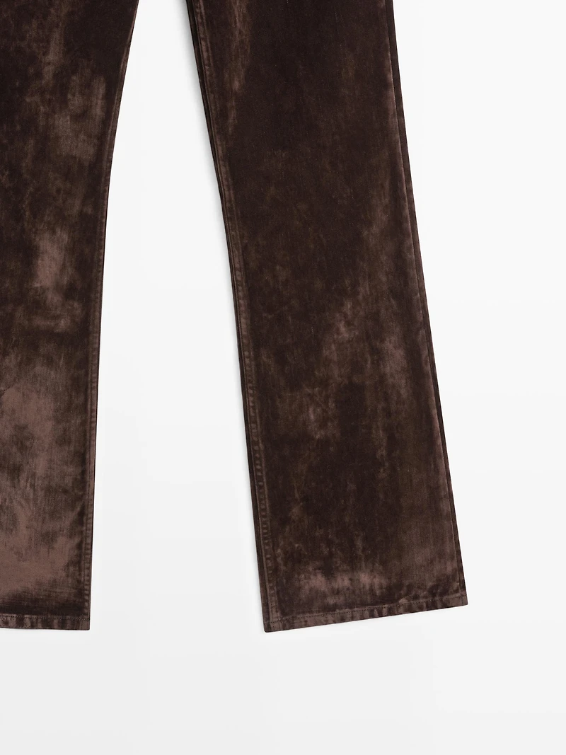 High-waist flocked boot-cut jeans