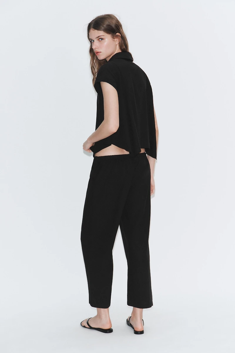 ASYMMETRICAL FLOWY SHIRT
