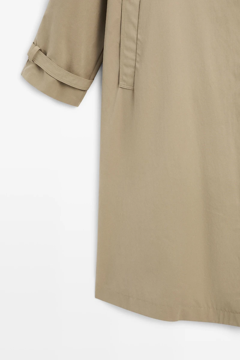 Long trench coat with buckle detail