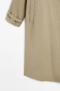 Long trench coat with buckle detail