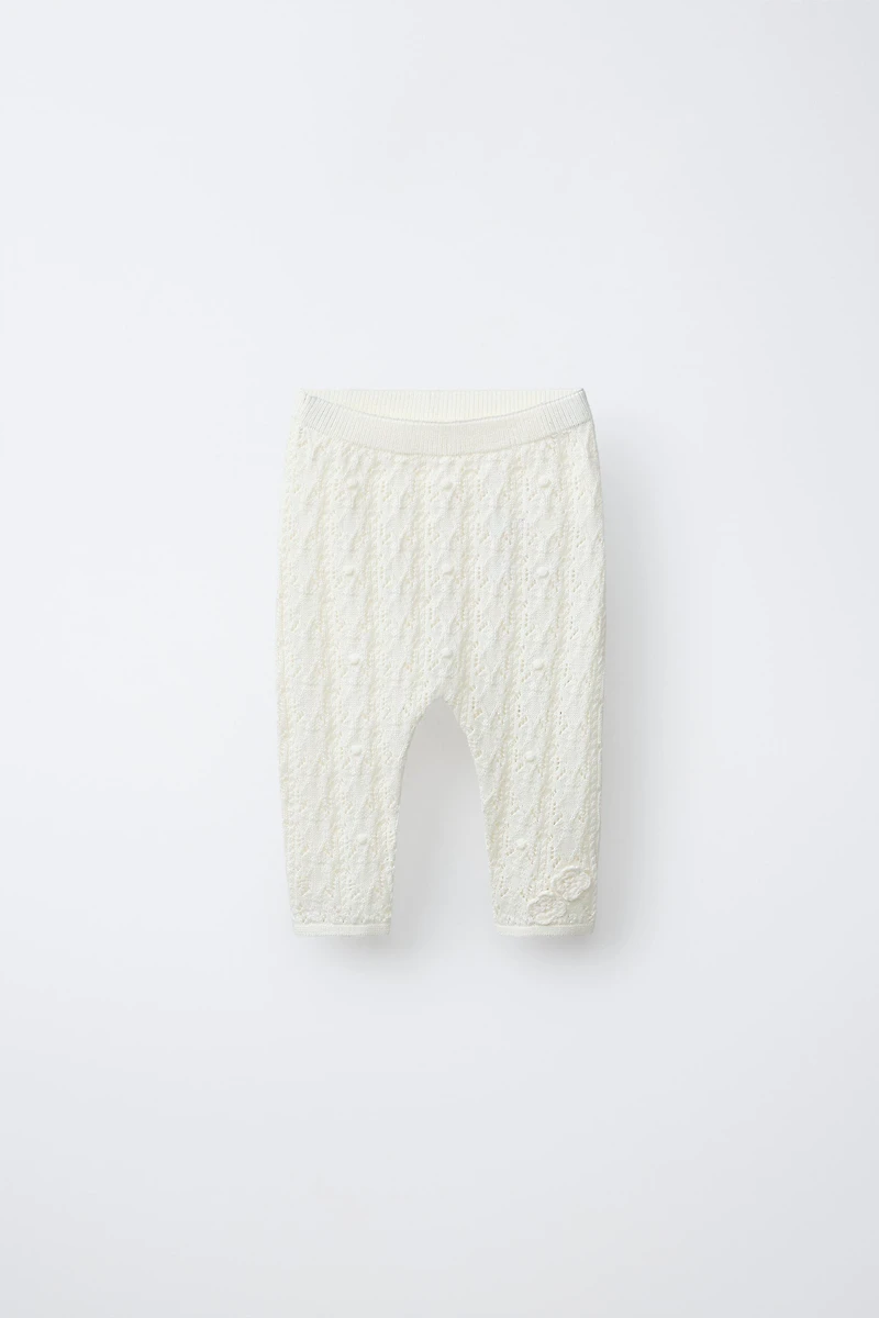 PANTALON EN MAILLE AJOURÉE