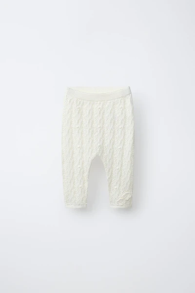 PANTALON EN MAILLE AJOURÉE