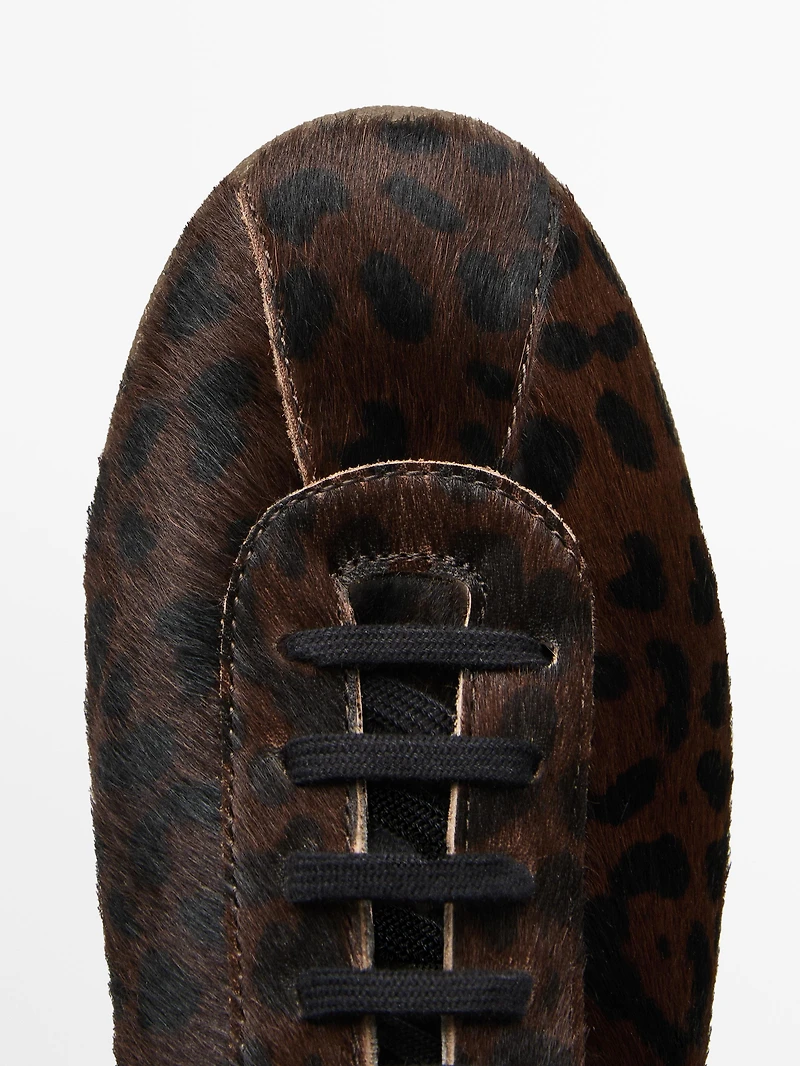 Animal print faux fur trainers