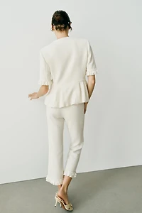 MINI FLARE RUFFLED PANTS