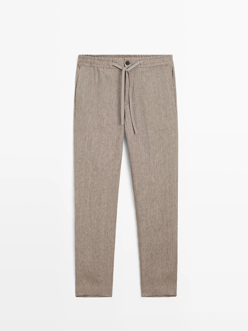 Faded total look linen trousers