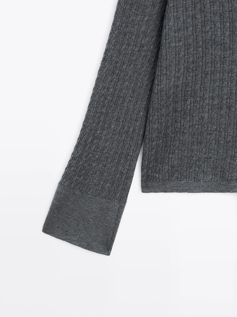 V-neck cable-knit sweater