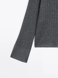 V-neck cable-knit sweater