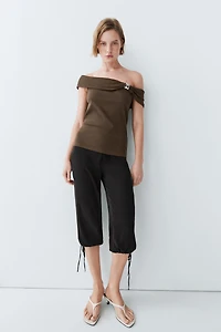 Off-the-shoulder top with jewel detail