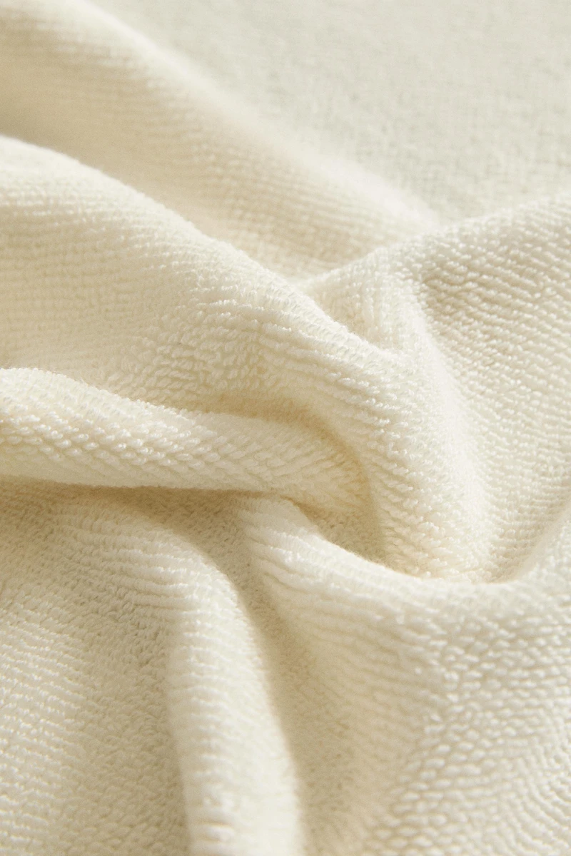 SERVIETTE DE BAIN POINT RIZ BORDURE