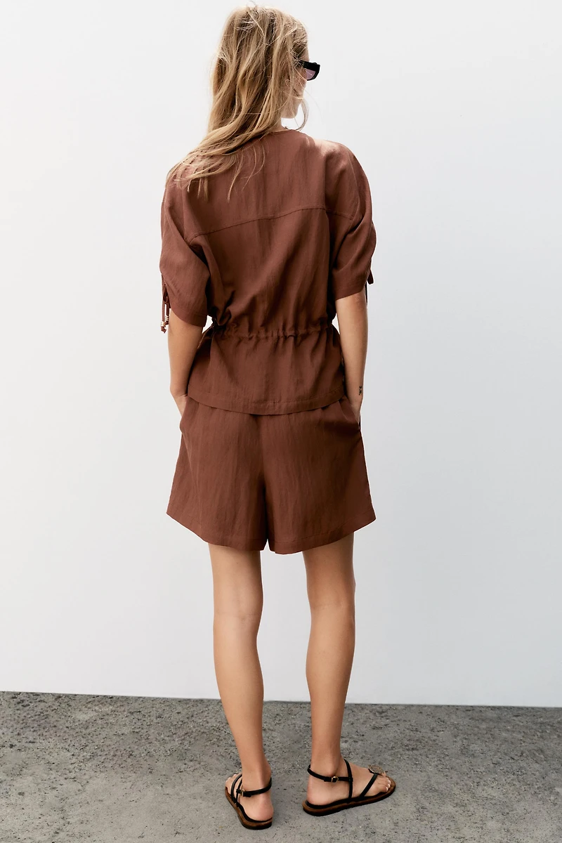 SHORT SLEEVE BEADED SAFARI JACKET