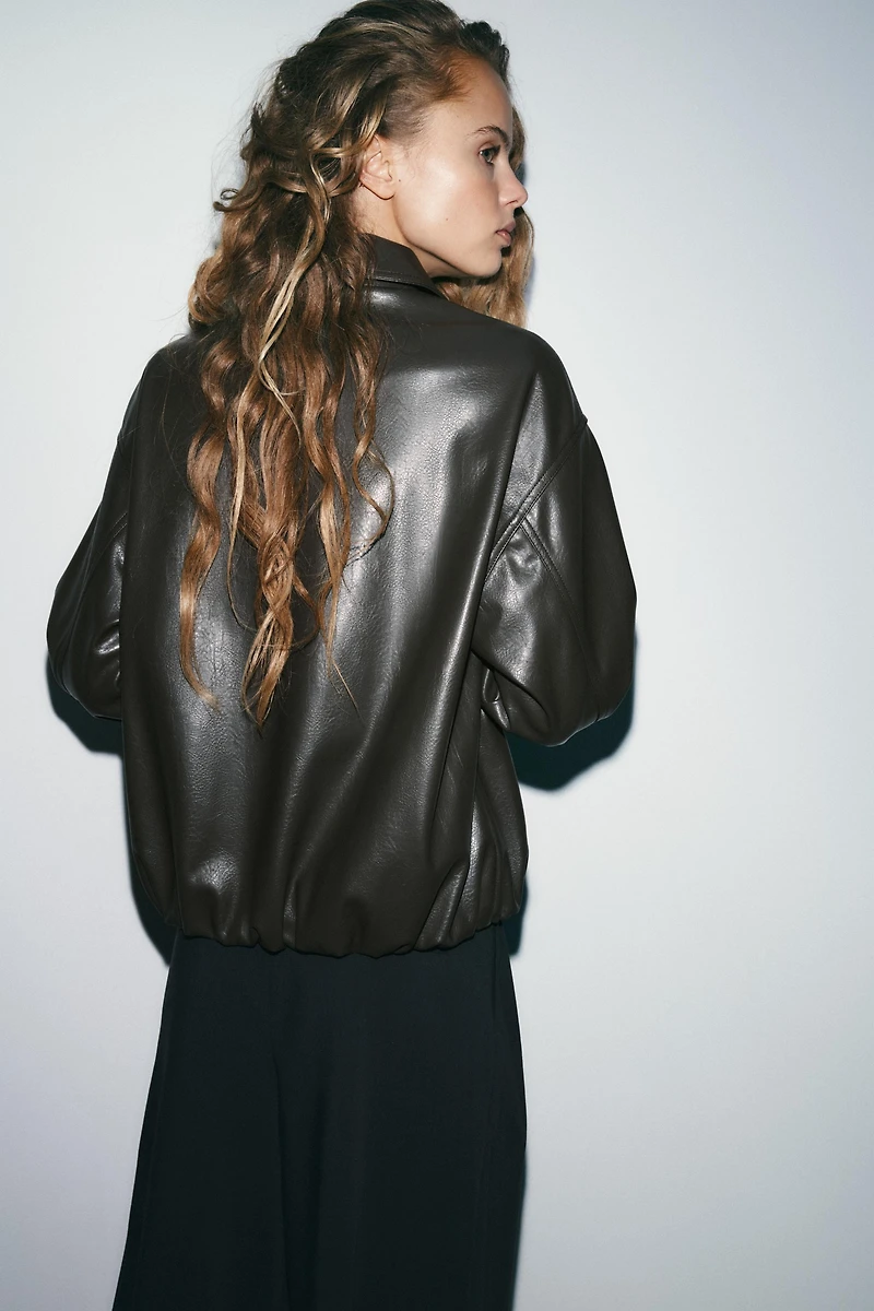 FAUX LEATHER JACKET WITH ELASTICATED DETAILS