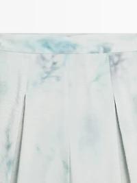 Printed trousers with pleat details