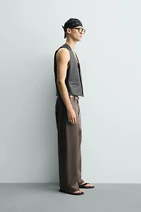 GILET EN CUIR COUTURES CONTRASTANTES
