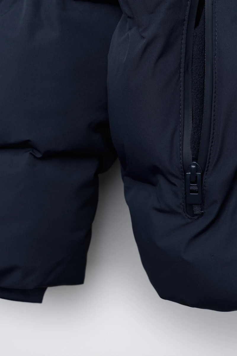 MANTEAU MATELASSÉ ÉTIQUETTE WATER REPELLENT