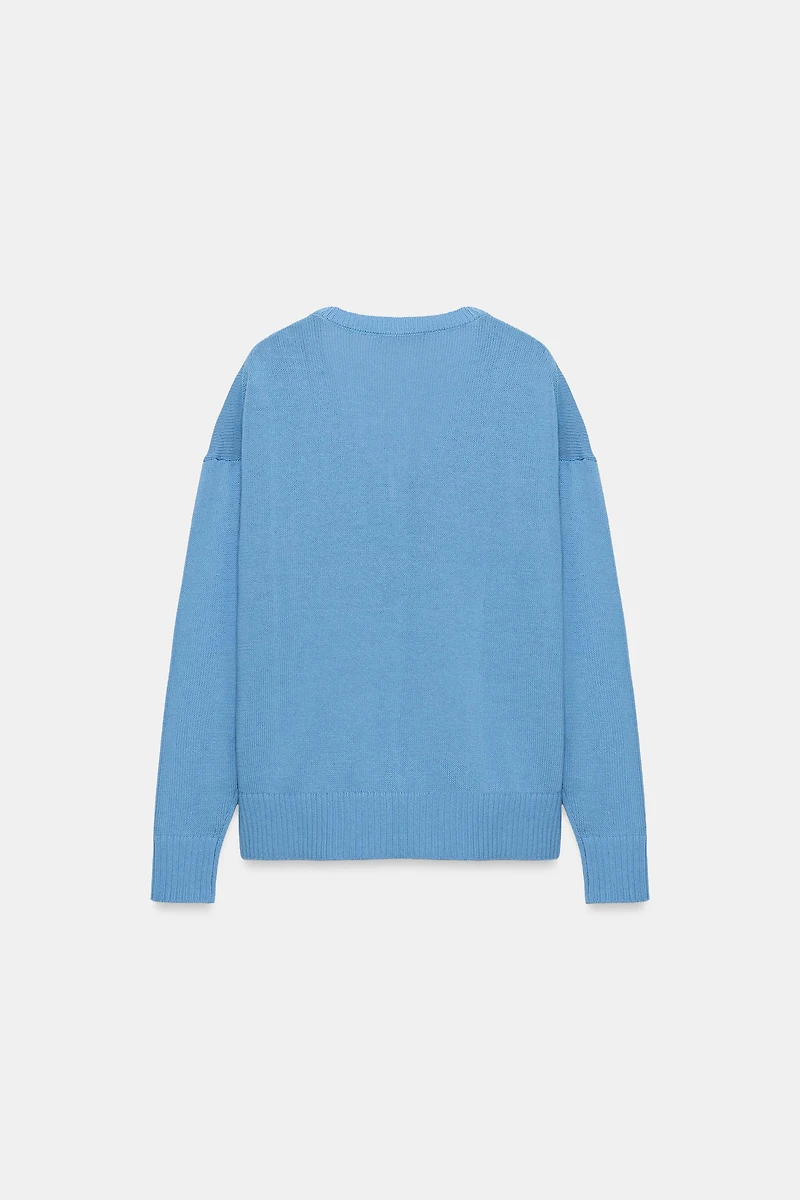 PULL EN MAILLE COL V