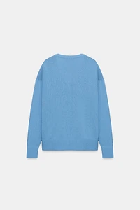 PULL EN MAILLE COL V