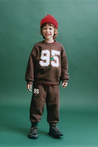 EMBROIDERED ANIMAL NUMBER SWEATSHIRT