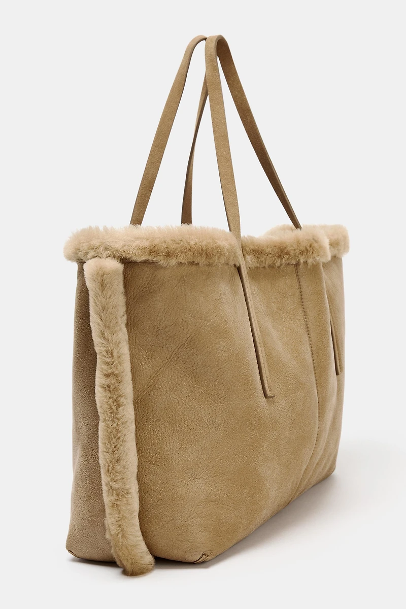 REVERSIBLE LEATHER BAG