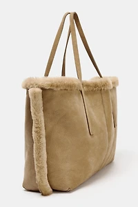 REVERSIBLE LEATHER BAG