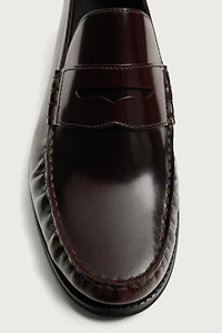 MOCASSINS EN CUIR À MASQUE