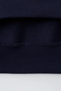 ENSEMBLE SWEAT ET PANTALON EN MOLLETON SURPIQUÉ